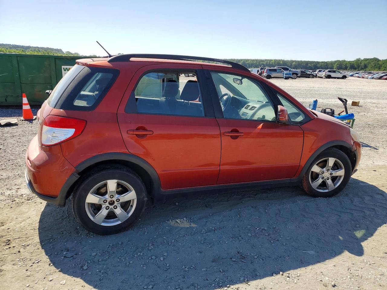 2011 Suzuki Sx4 Red vin: JS2YB5A31B6304947