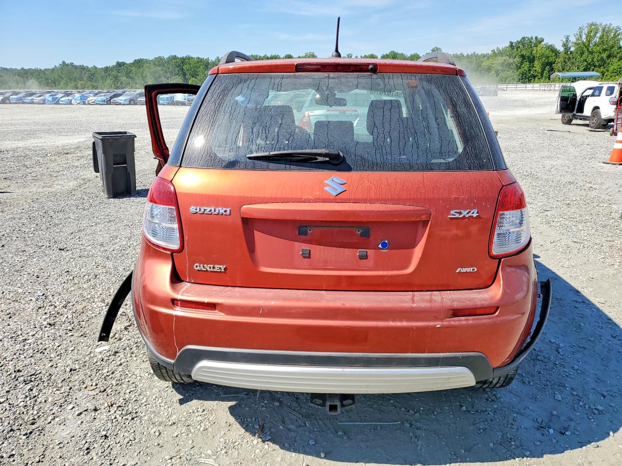 2011 Suzuki Sx4 Red vin: JS2YB5A31B6304947