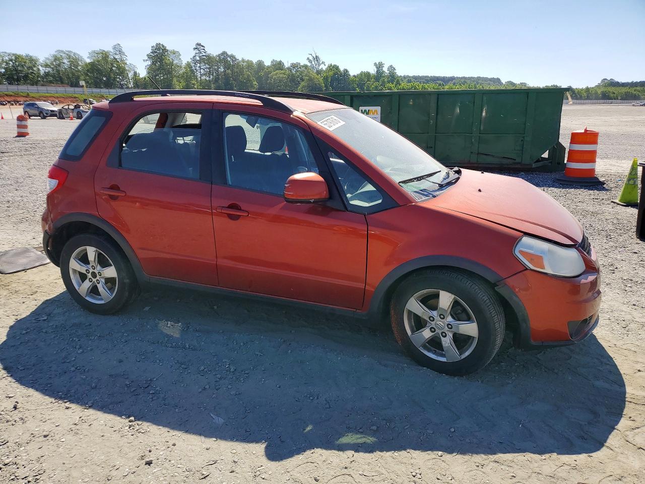 2011 Suzuki Sx4 Red vin: JS2YB5A31B6304947