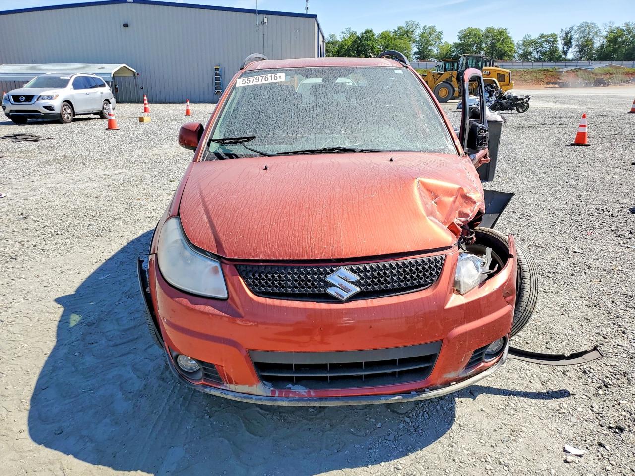 2011 Suzuki Sx4 Red vin: JS2YB5A31B6304947