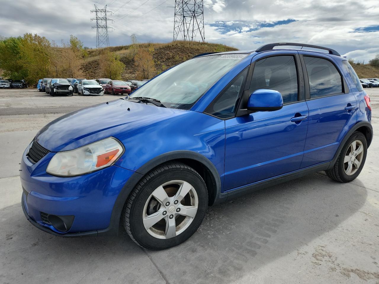 2012 Suzuki Sx4 Blue vin: JS2YB5A32C6304750