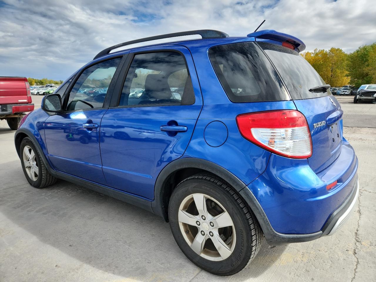 2012 Suzuki Sx4 Blue vin: JS2YB5A32C6304750