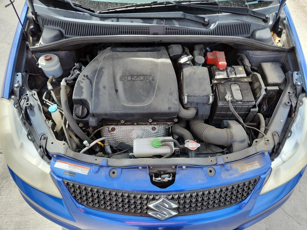2012 Suzuki Sx4 Blue vin: JS2YB5A32C6304750