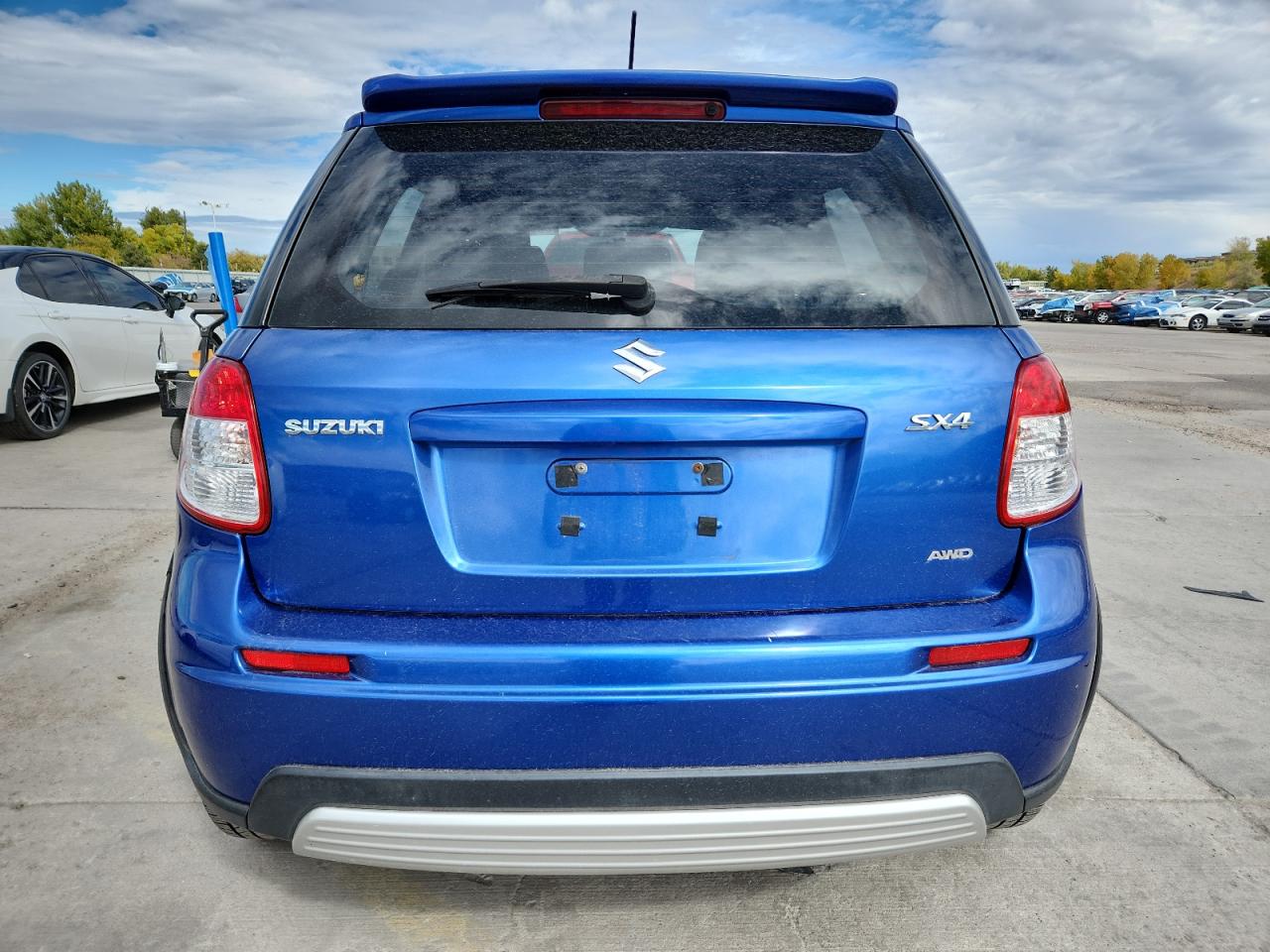 2012 Suzuki Sx4 Blue vin: JS2YB5A32C6304750
