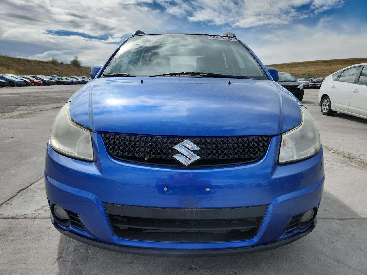 2012 Suzuki Sx4 Blue vin: JS2YB5A32C6304750