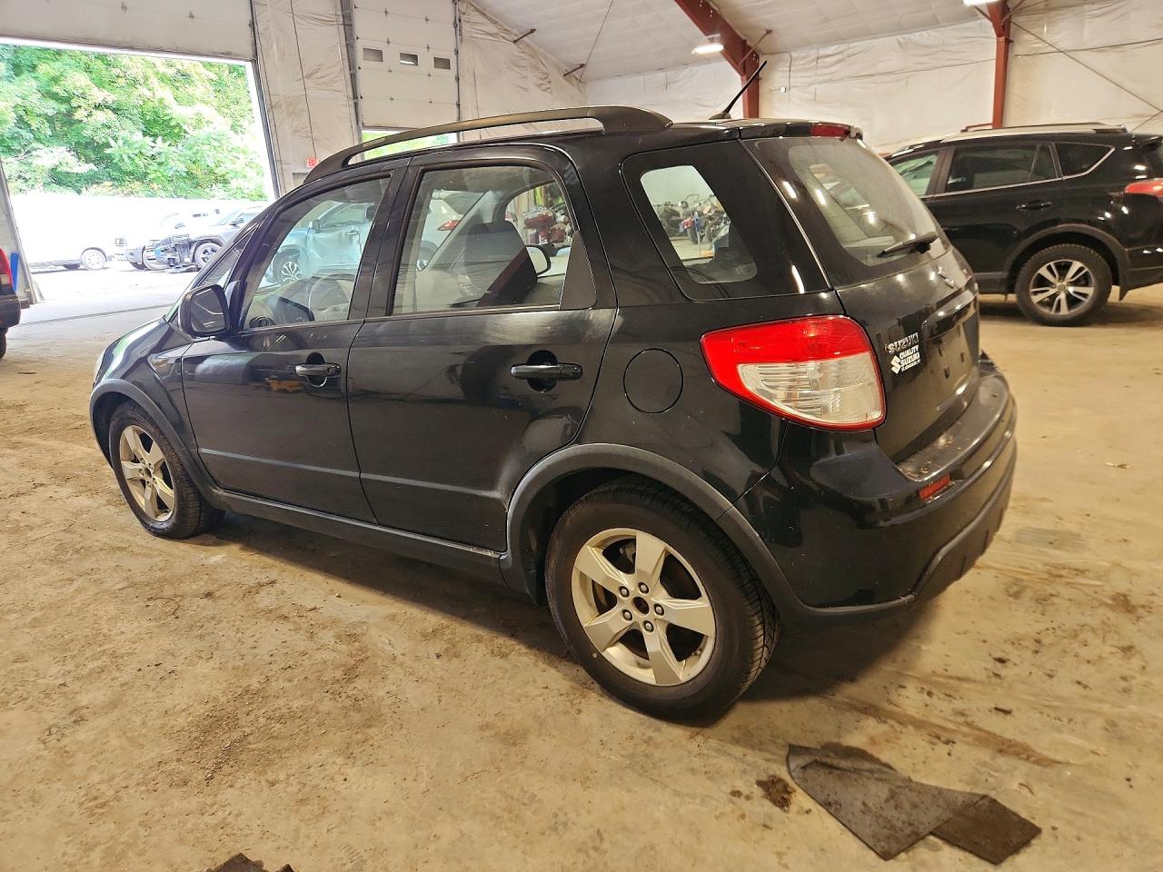 2012 Suzuki Sx4 Black vin: JS2YB5A32C6306840
