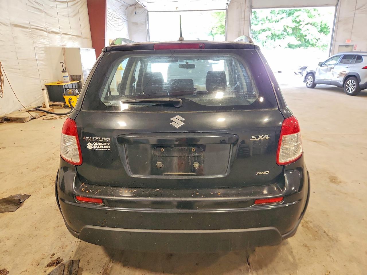 2012 Suzuki Sx4 Black vin: JS2YB5A32C6306840