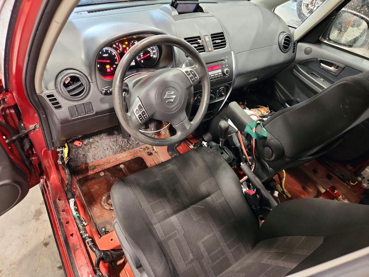 2010 Suzuki Sx4 Orange vin: JS2YB5A33A6300218
