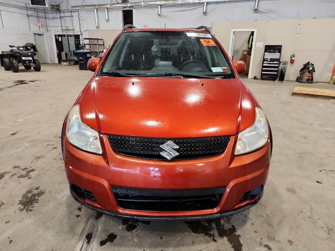 2010 Suzuki Sx4 Orange vin: JS2YB5A33A6300218