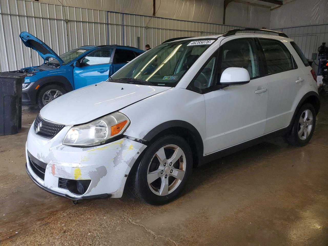 2012 Suzuki Sx4 White vin: JS2YB5A33C6305258