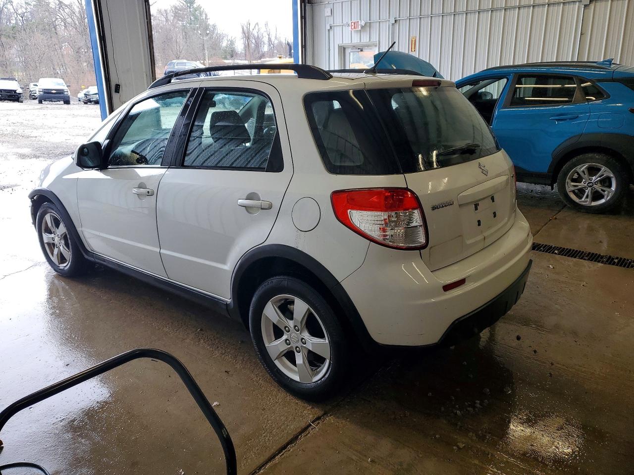 2012 Suzuki Sx4 White vin: JS2YB5A33C6305258