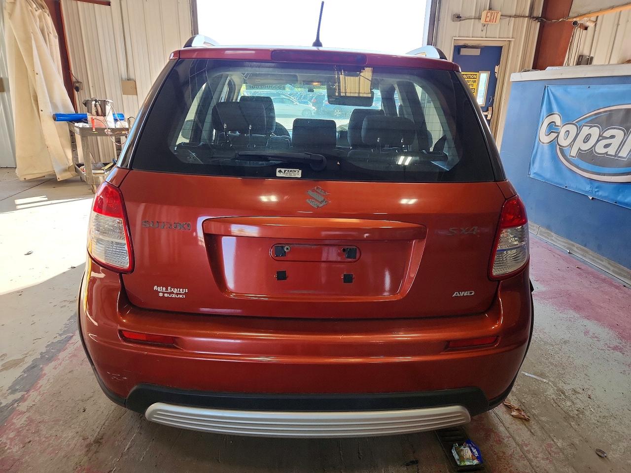 2012 Suzuki Sx4 Оранжевый vin: JS2YB5A33C6306426