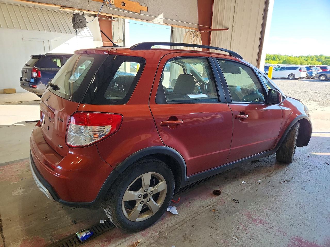 2012 Suzuki Sx4 Оранжевый vin: JS2YB5A33C6306426