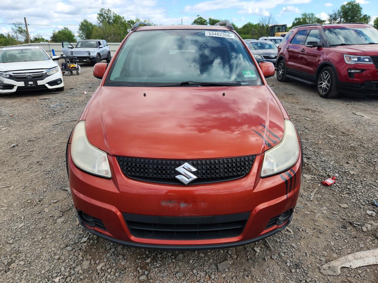 2012 Suzuki Sx4 Orange vin: JS2YB5A33C6307317