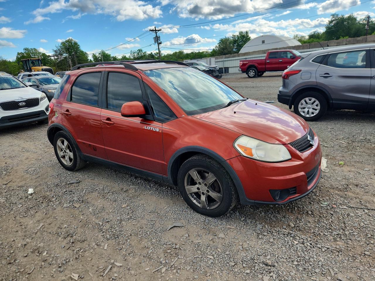 2012 Suzuki Sx4 Orange vin: JS2YB5A33C6307317