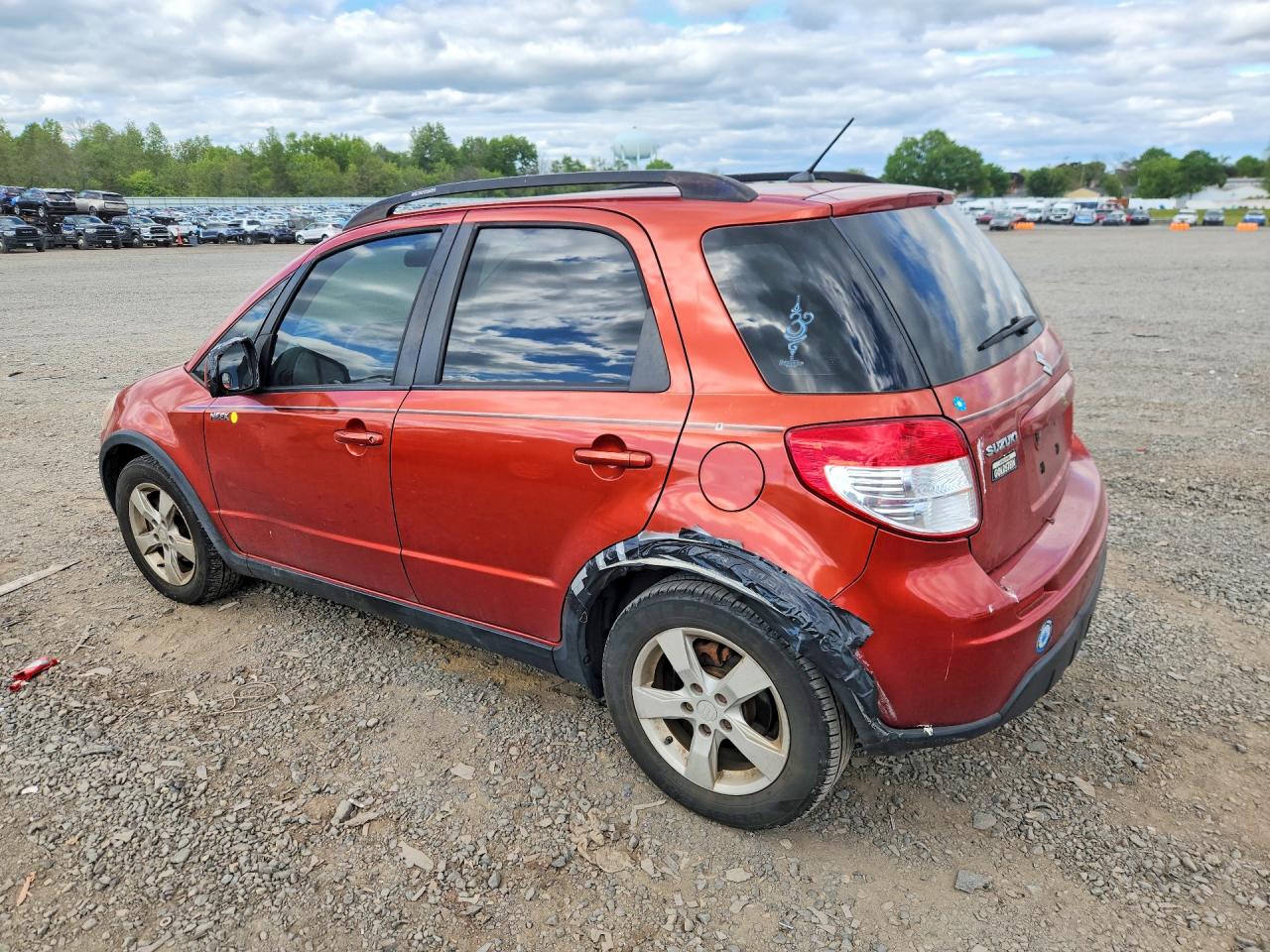 2012 Suzuki Sx4 Orange vin: JS2YB5A33C6307317