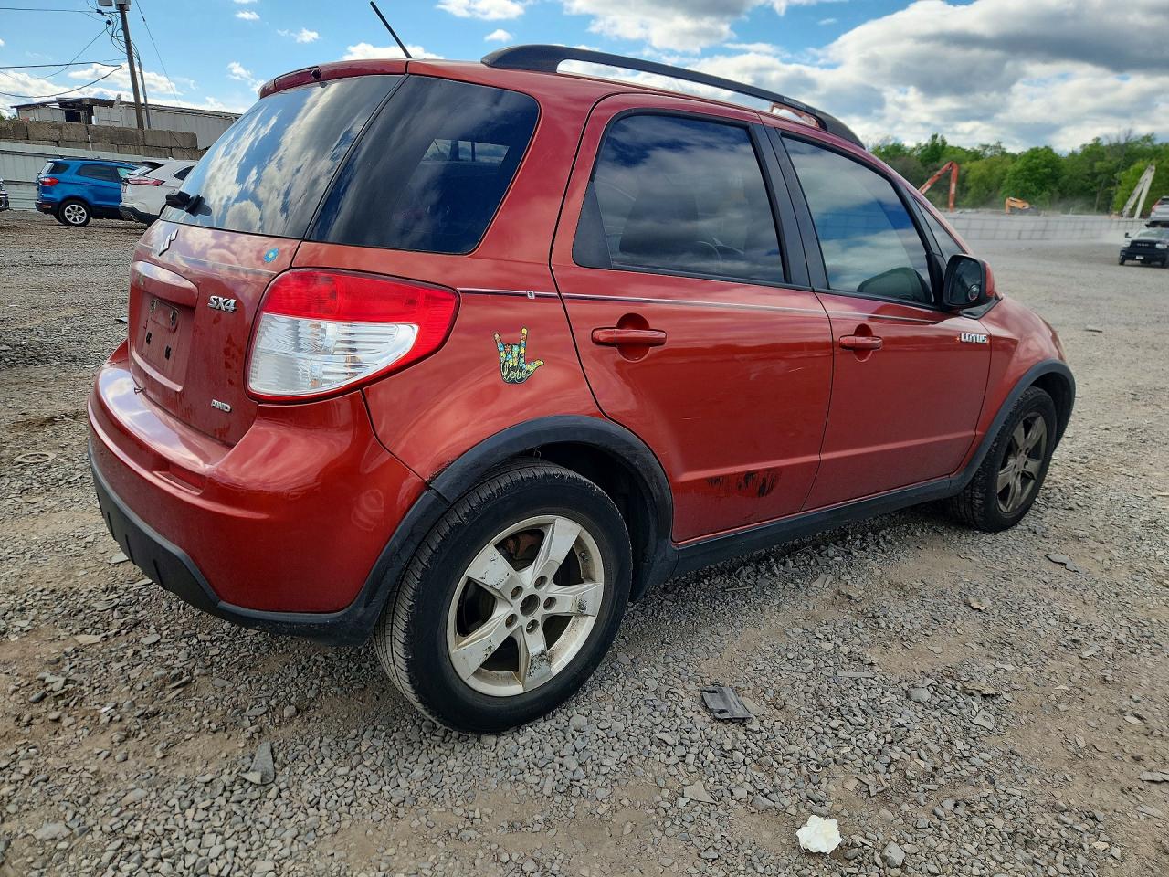2012 Suzuki Sx4 Orange vin: JS2YB5A33C6307317