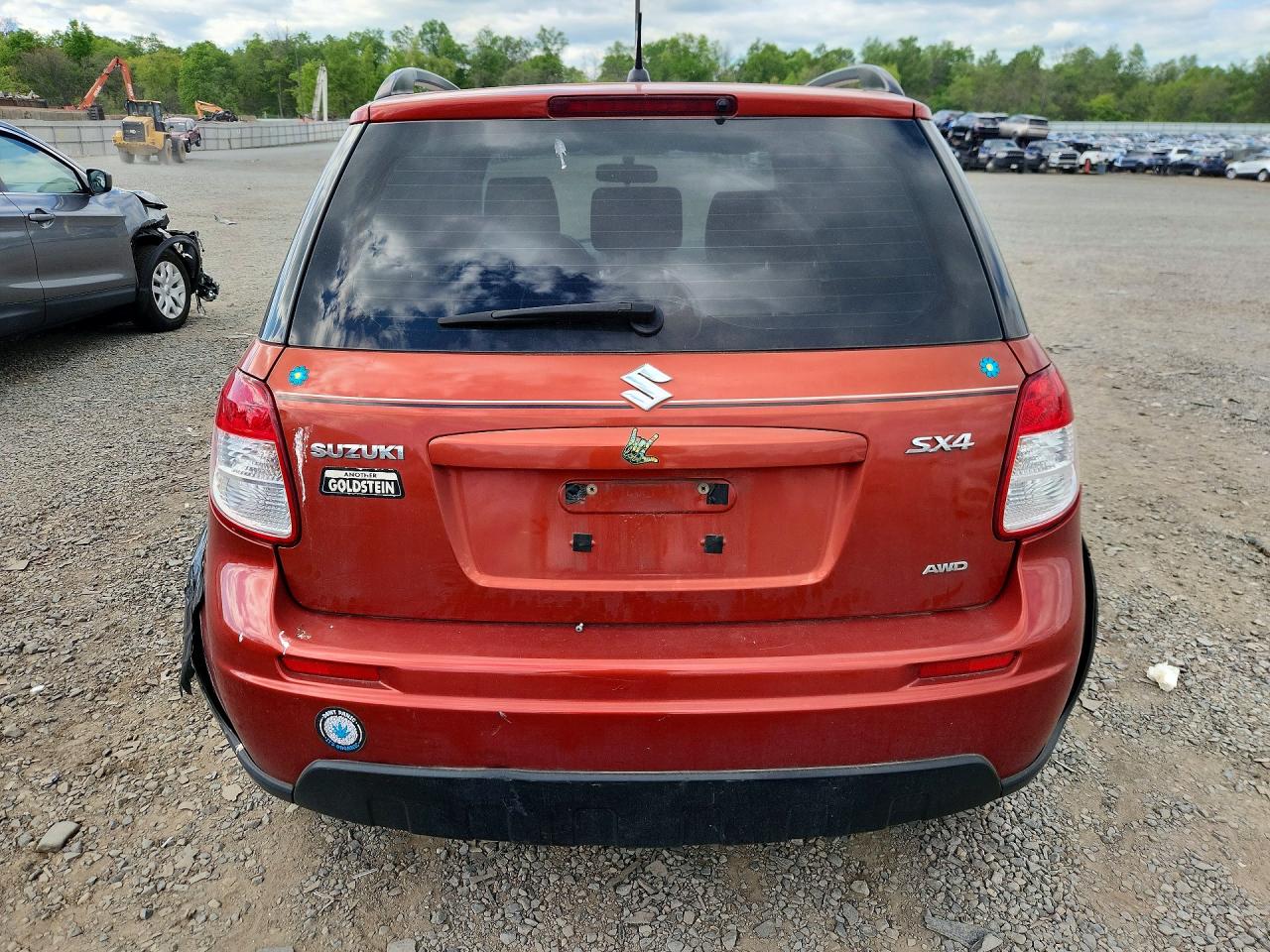2012 Suzuki Sx4 Orange vin: JS2YB5A33C6307317