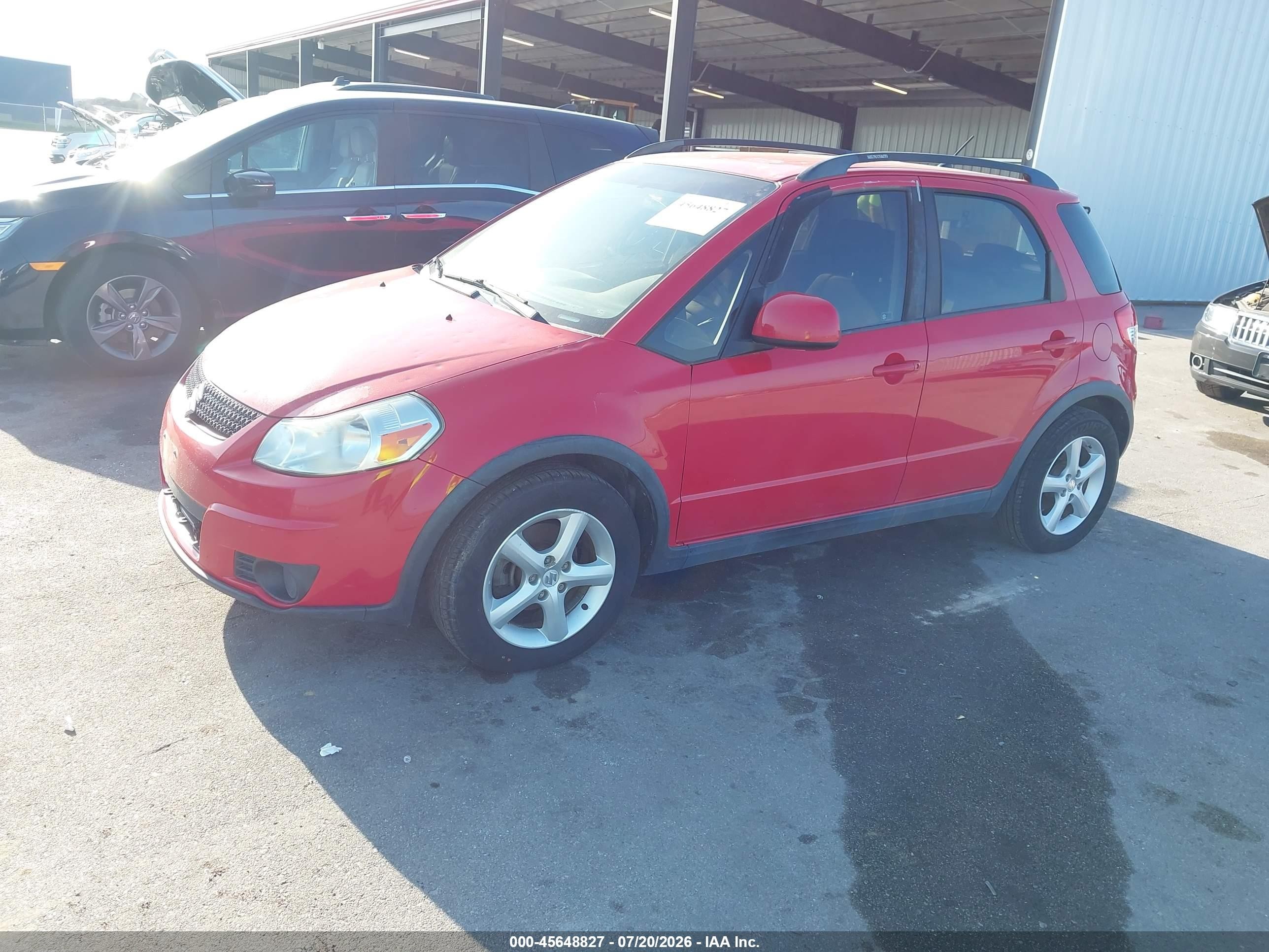 2010 Suzuki Sx4 Technology Red vin: JS2YB5A36A6310810