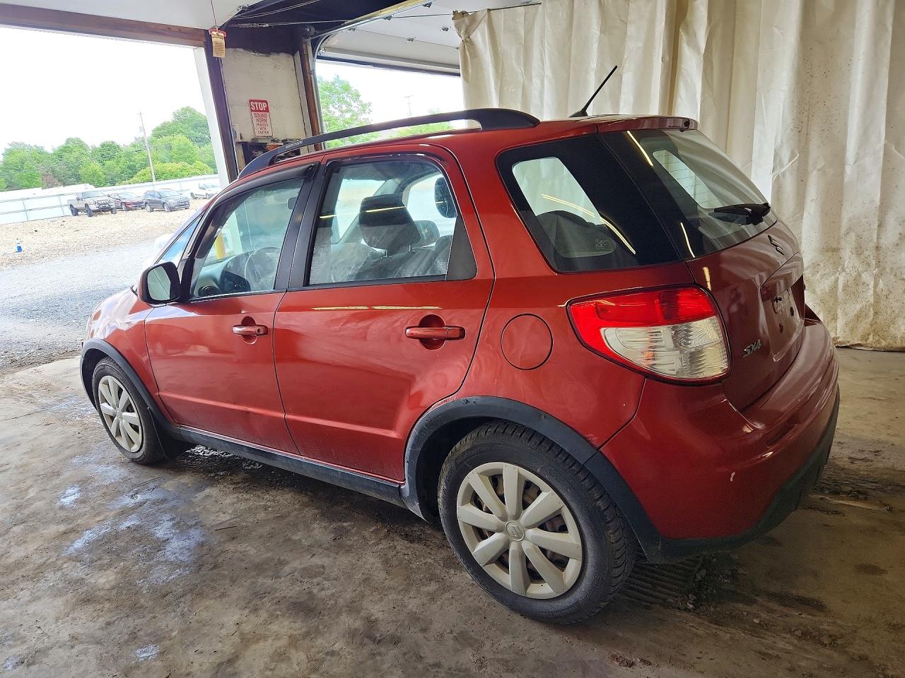 2010 Suzuki Sx4 Orange vin: JS2YB5A36A6311441