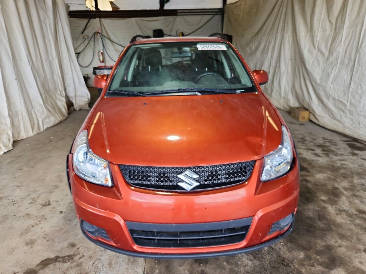 2010 Suzuki Sx4 Orange vin: JS2YB5A36A6311441