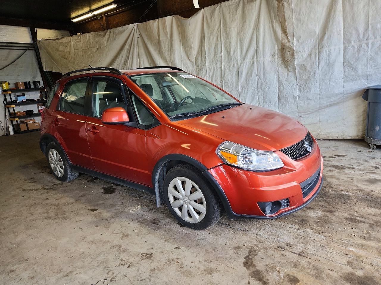 2010 Suzuki Sx4 Orange vin: JS2YB5A36A6311441