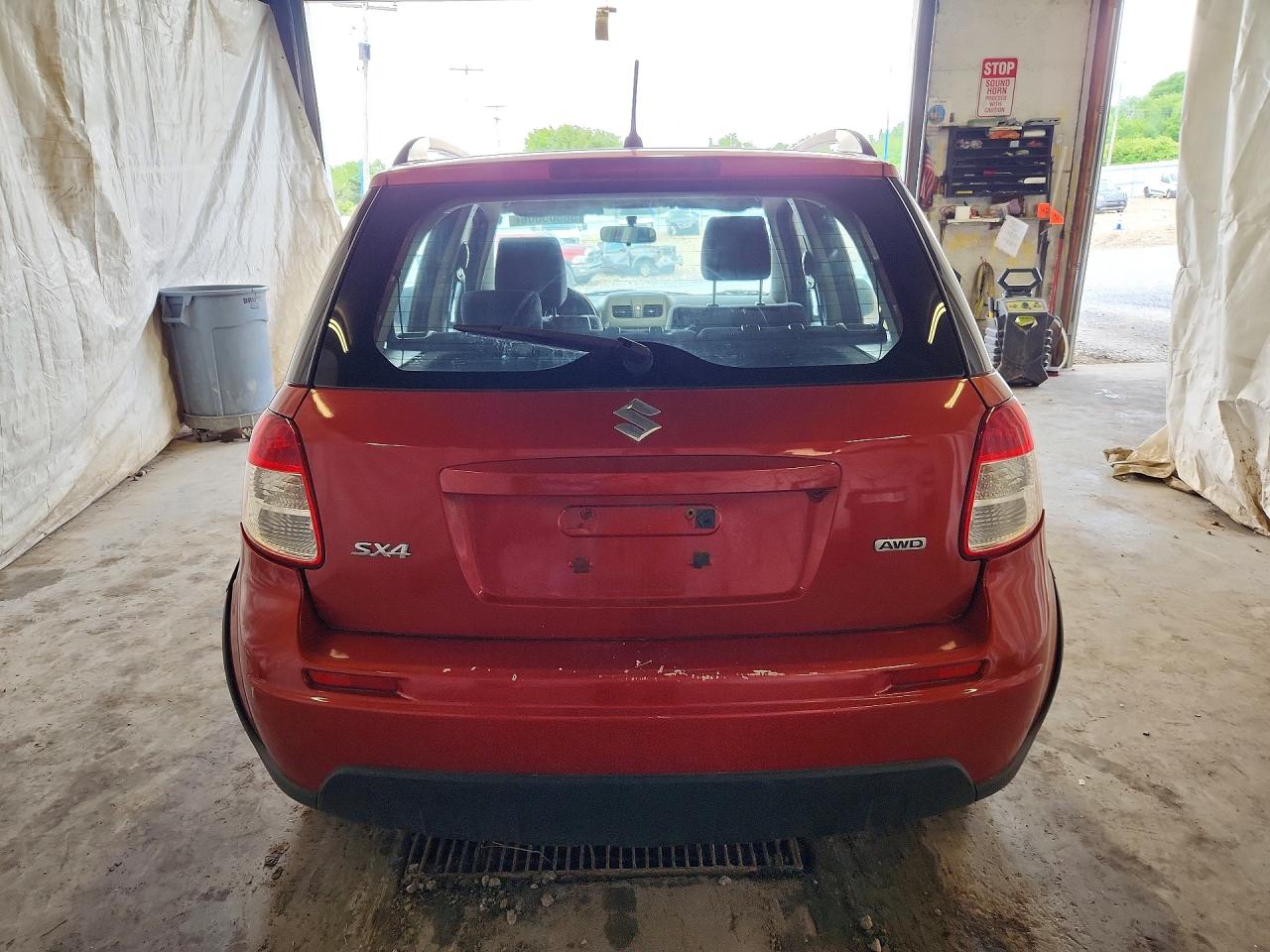2010 Suzuki Sx4 Orange vin: JS2YB5A36A6311441