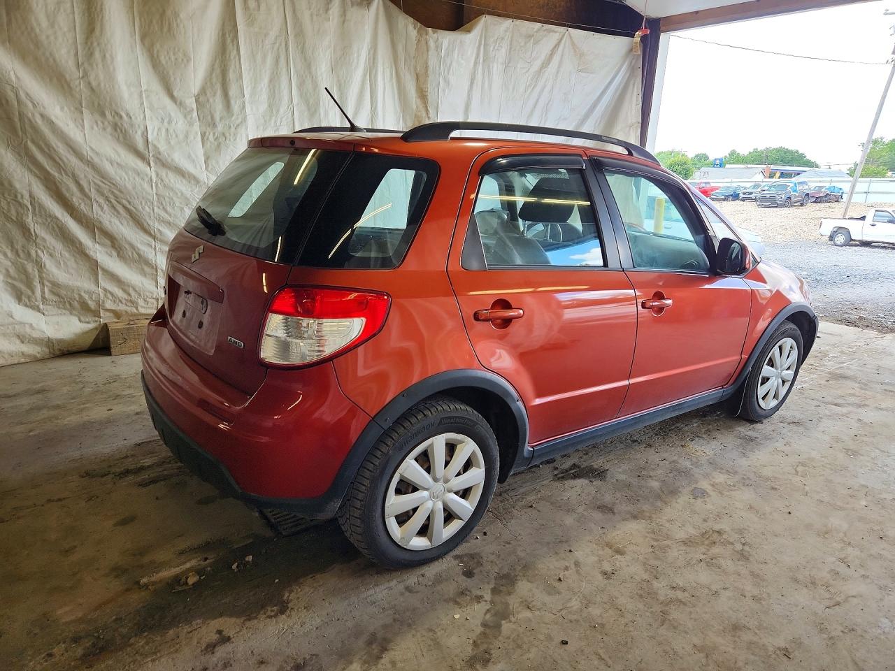 2010 Suzuki Sx4 Orange vin: JS2YB5A36A6311441