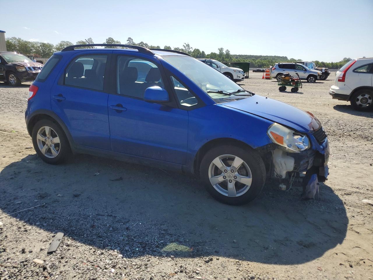 2012 Suzuki Sx4 Blue vin: JS2YB5A36C6300913