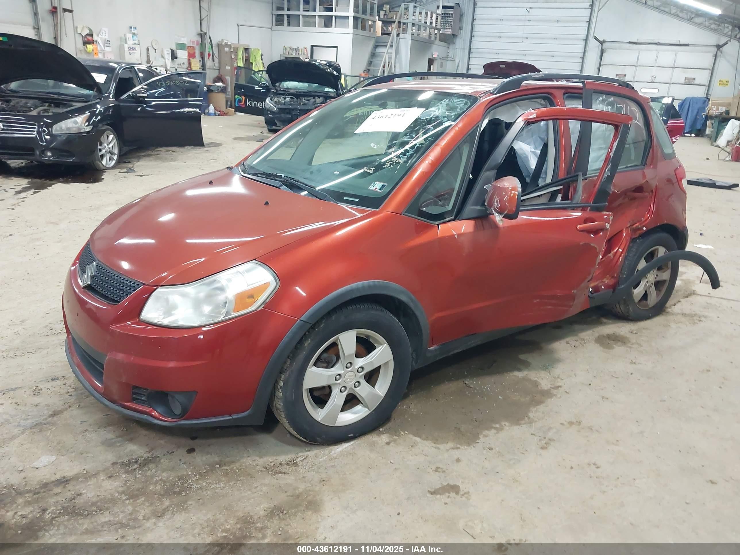 2012 Suzuki Sx4   Orange vin: JS2YB5A36C6302516