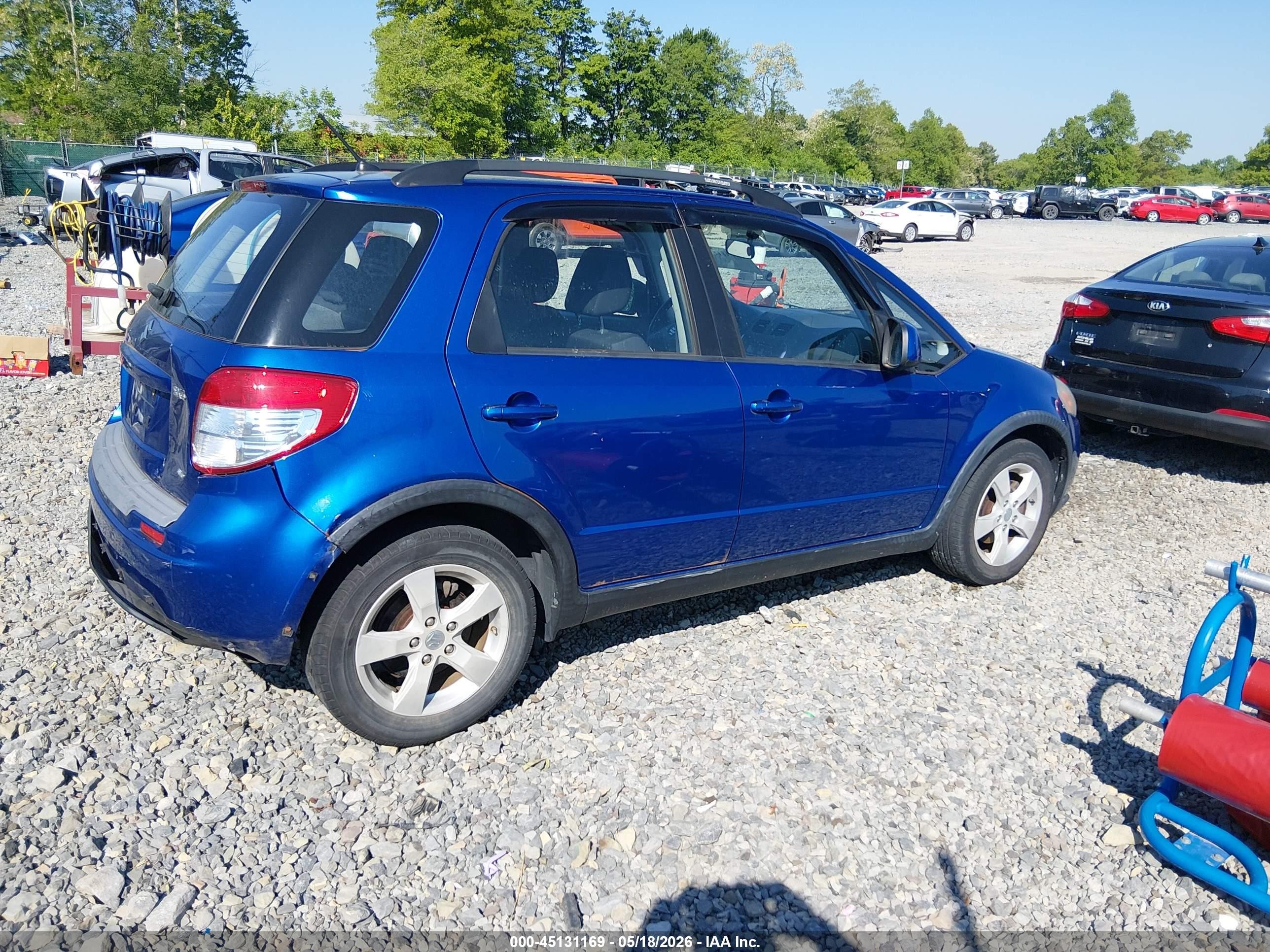 2012 Suzuki Sx4 Premium/tech Valu Pkg (nav) Blue vin: JS2YB5A38C6303618