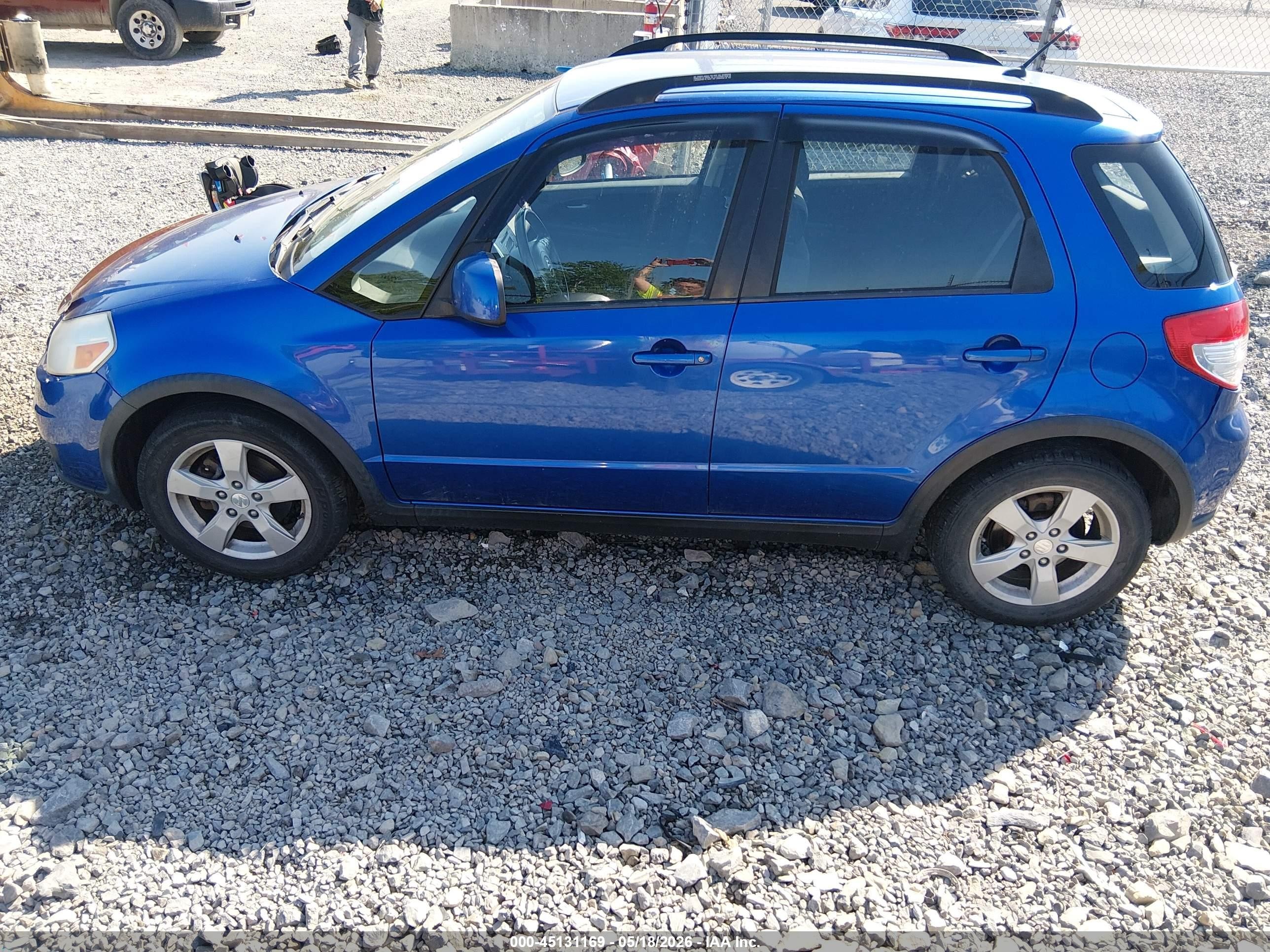 2012 Suzuki Sx4 Premium/tech Valu Pkg (nav) Blue vin: JS2YB5A38C6303618