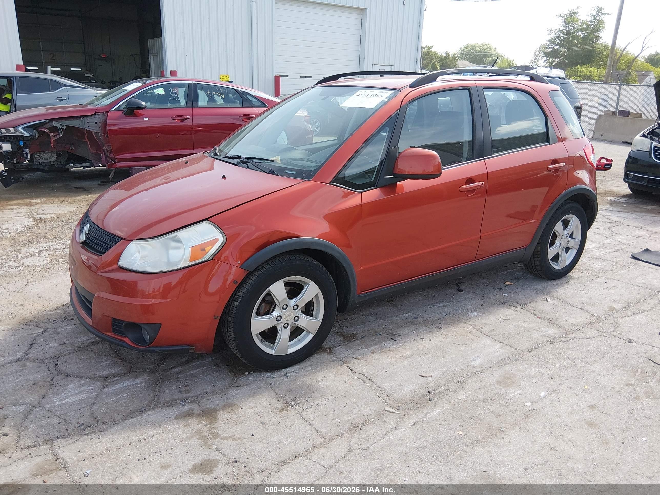 2011 Suzuki Sx4 Premium/tech Valu Pkg (nav) Orange vin: JS2YB5A3XB6301853