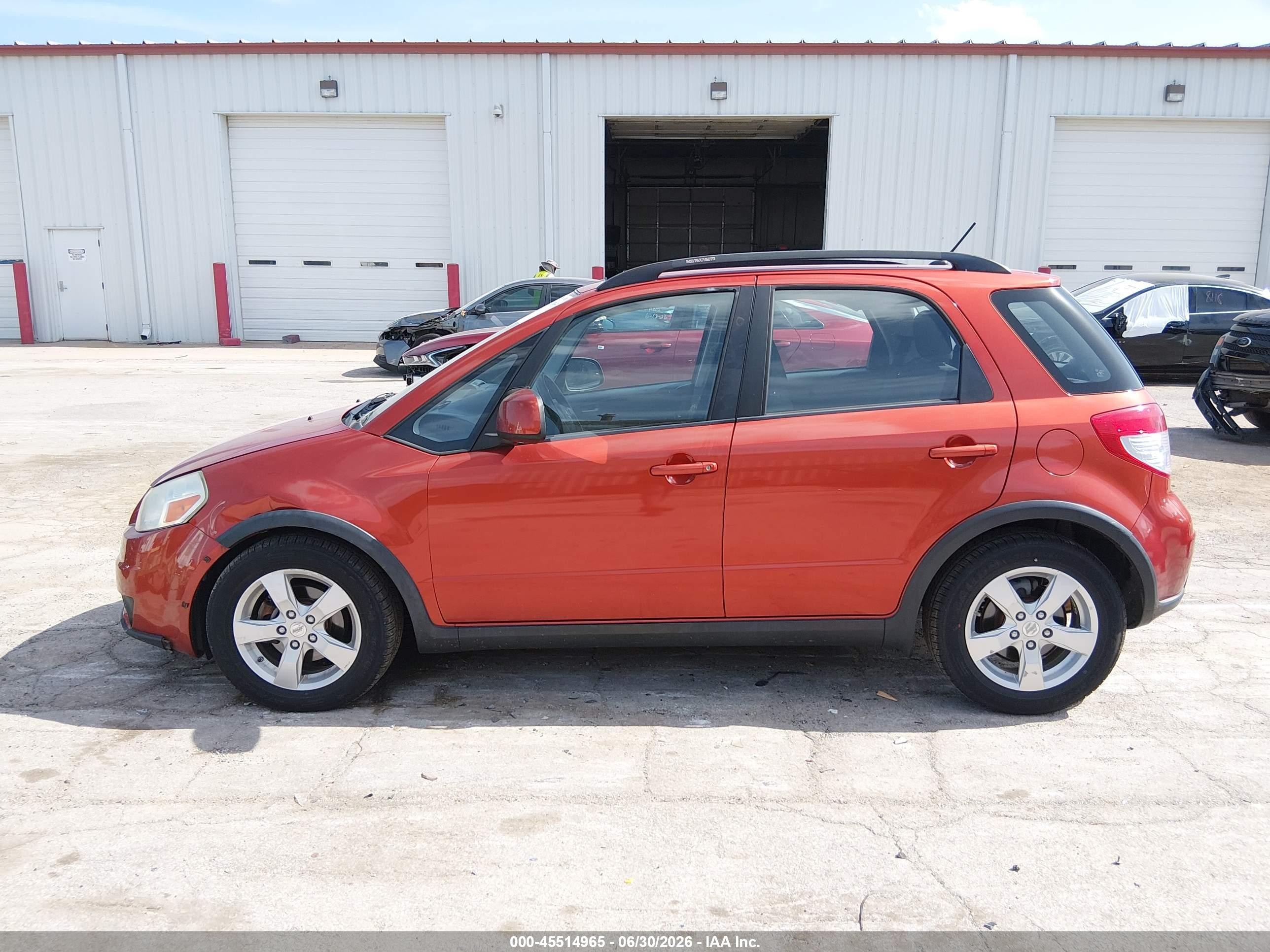 2011 Suzuki Sx4 Premium/tech Valu Pkg (nav) Orange vin: JS2YB5A3XB6301853