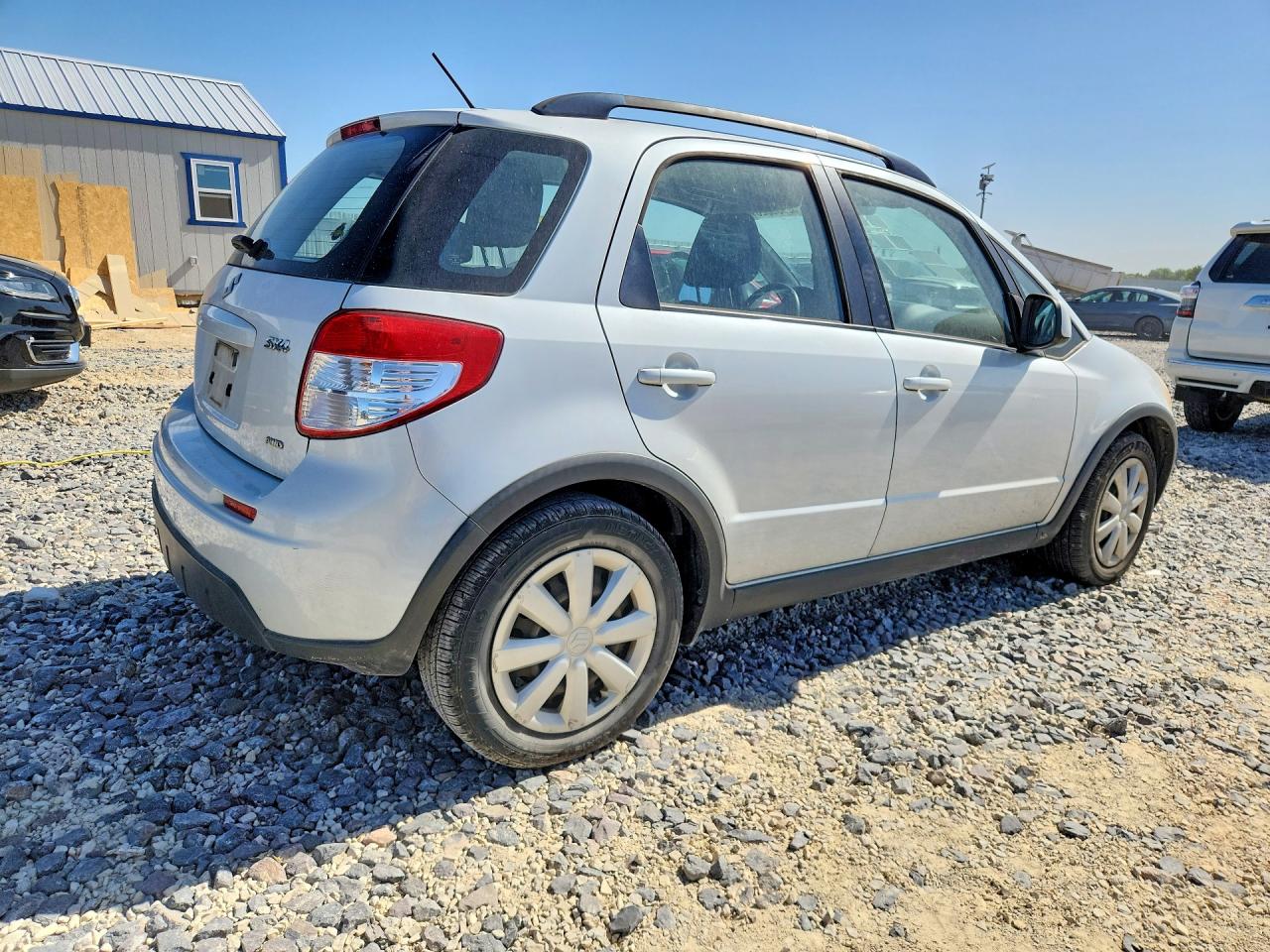 2012 Suzuki Sx4 White vin: JS2YB5A3XC6302325