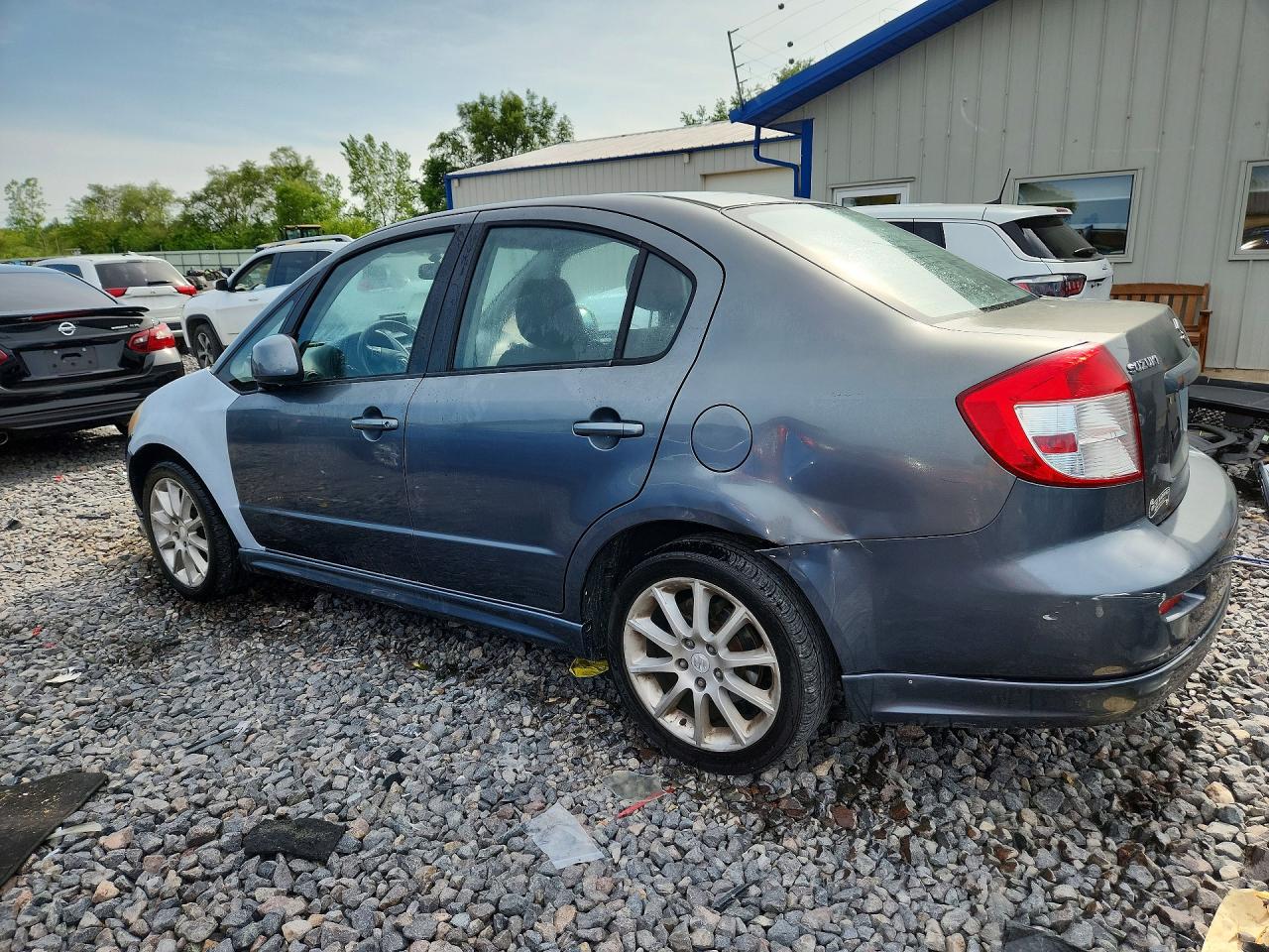 2009 Suzuki Sx4 Sport Teal vin: JS2YC414796200859