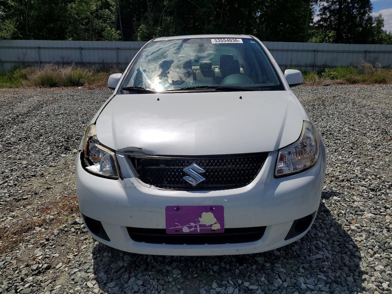 2011 Suzuki Sx4 Le White vin: JS2YC5A23B6304436