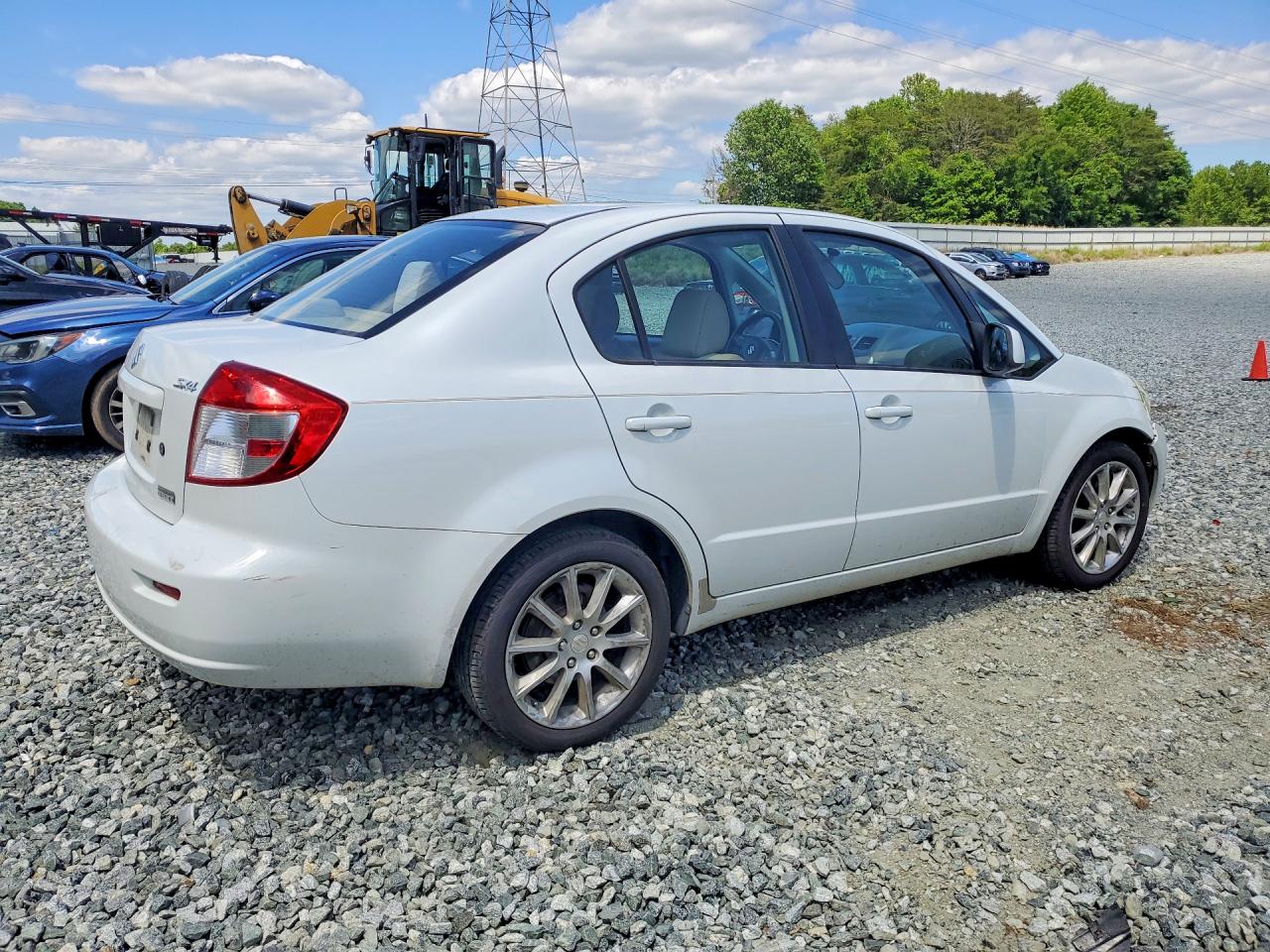 2011 Suzuki Sx4 Le White vin: JS2YC5A23B6304436