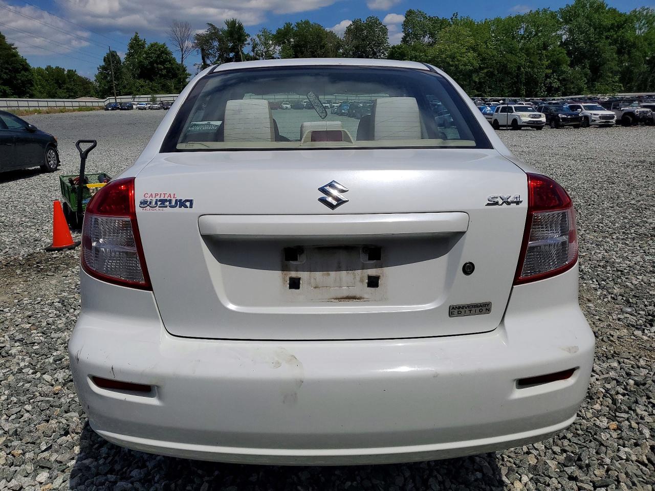 2011 Suzuki Sx4 Le White vin: JS2YC5A23B6304436