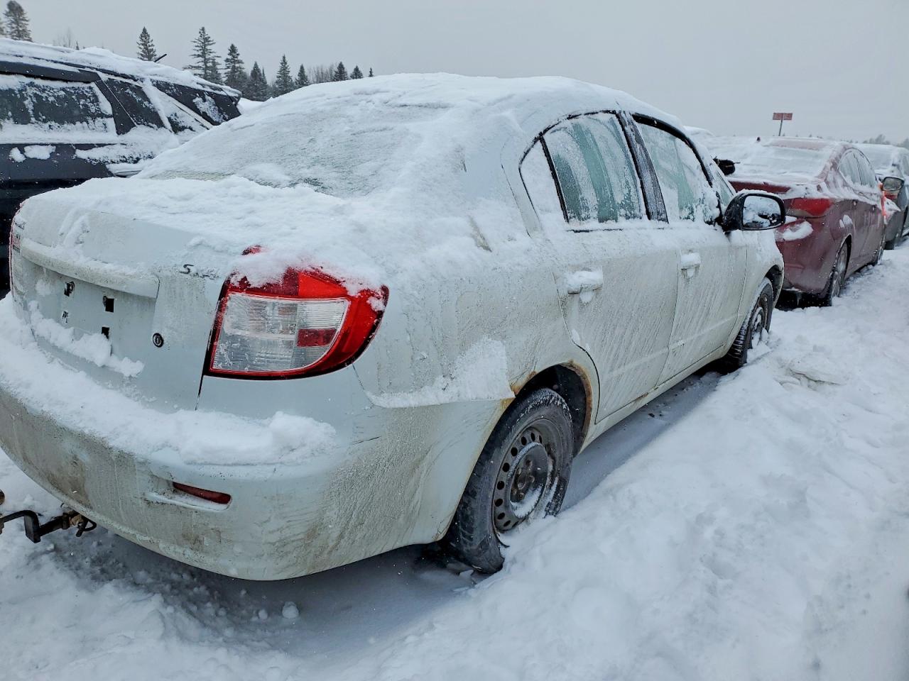 2010 Suzuki Sx4 Le White vin: JS2YC5A25A6304145