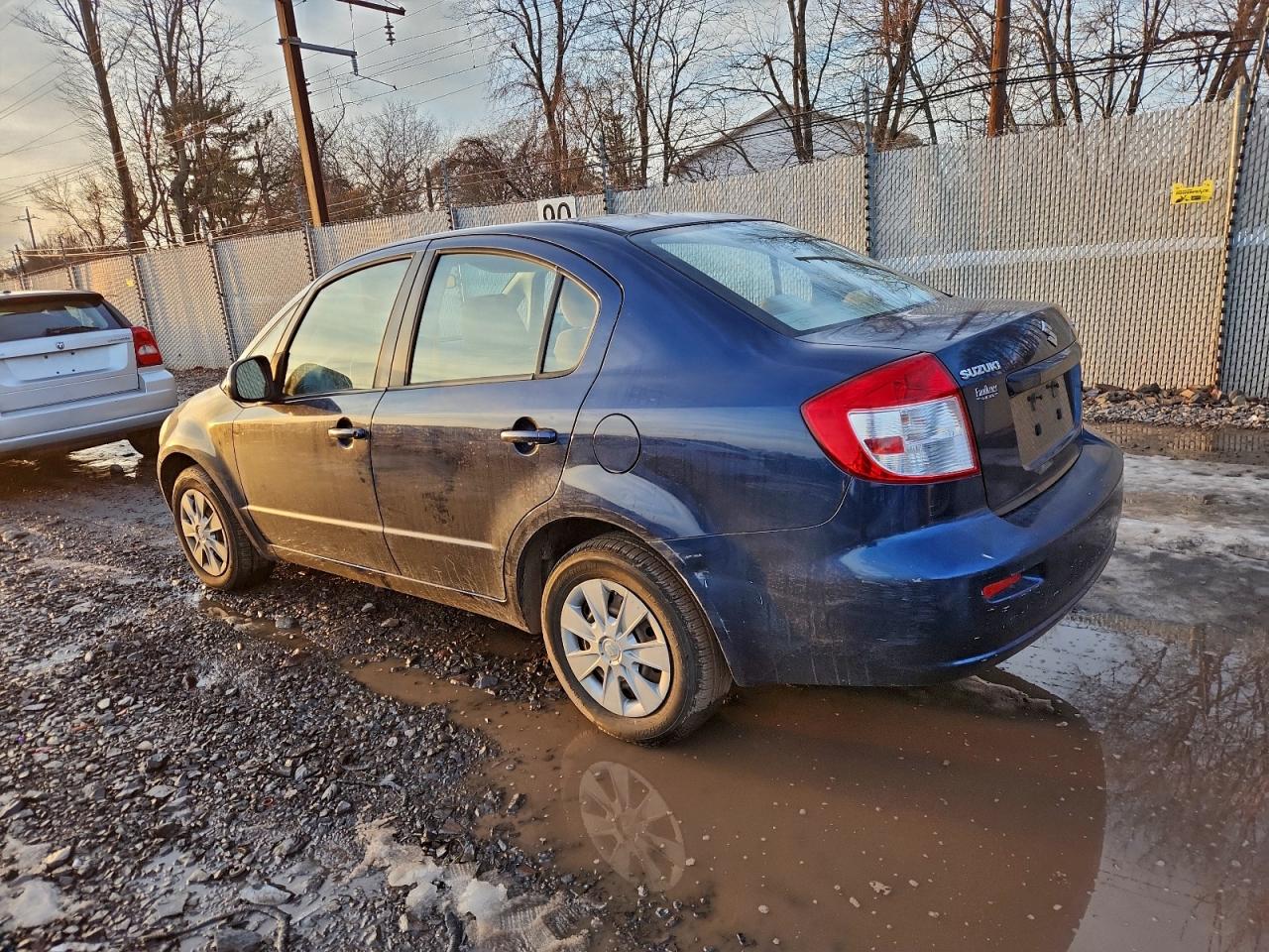 2010 Suzuki Sx4 Le Синий vin: JS2YC5A26A6300847