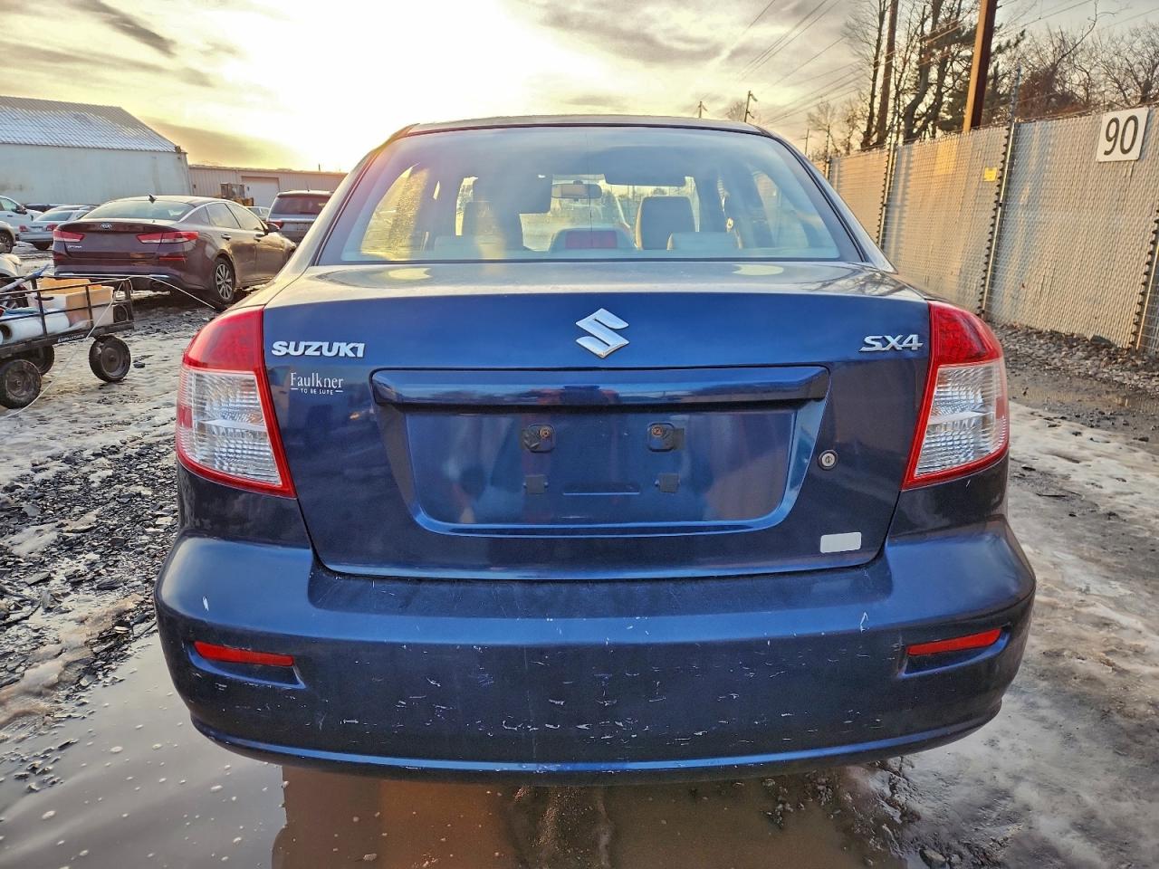 2010 Suzuki Sx4 Le Синий vin: JS2YC5A26A6300847