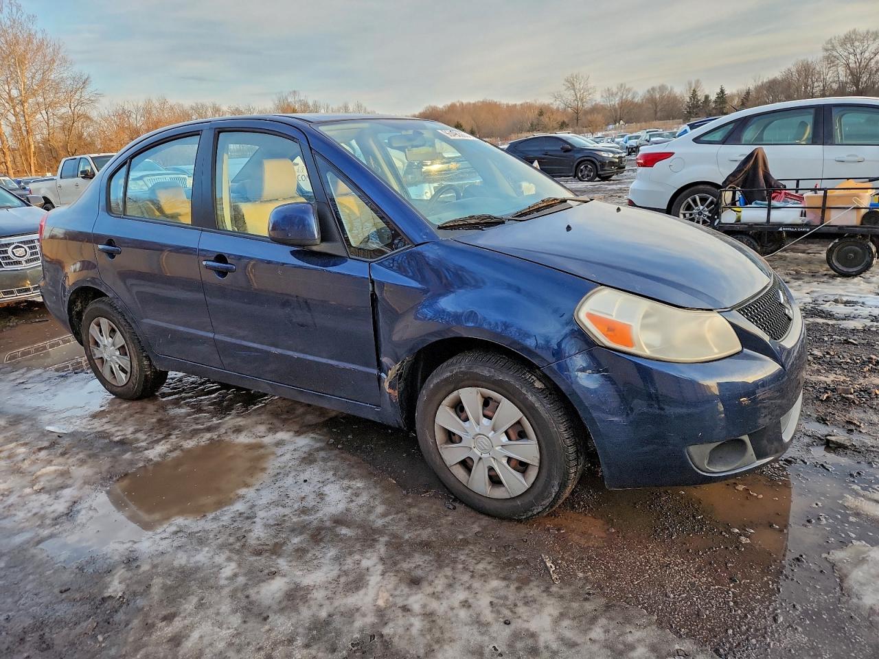 2010 Suzuki Sx4 Le Синий vin: JS2YC5A26A6300847