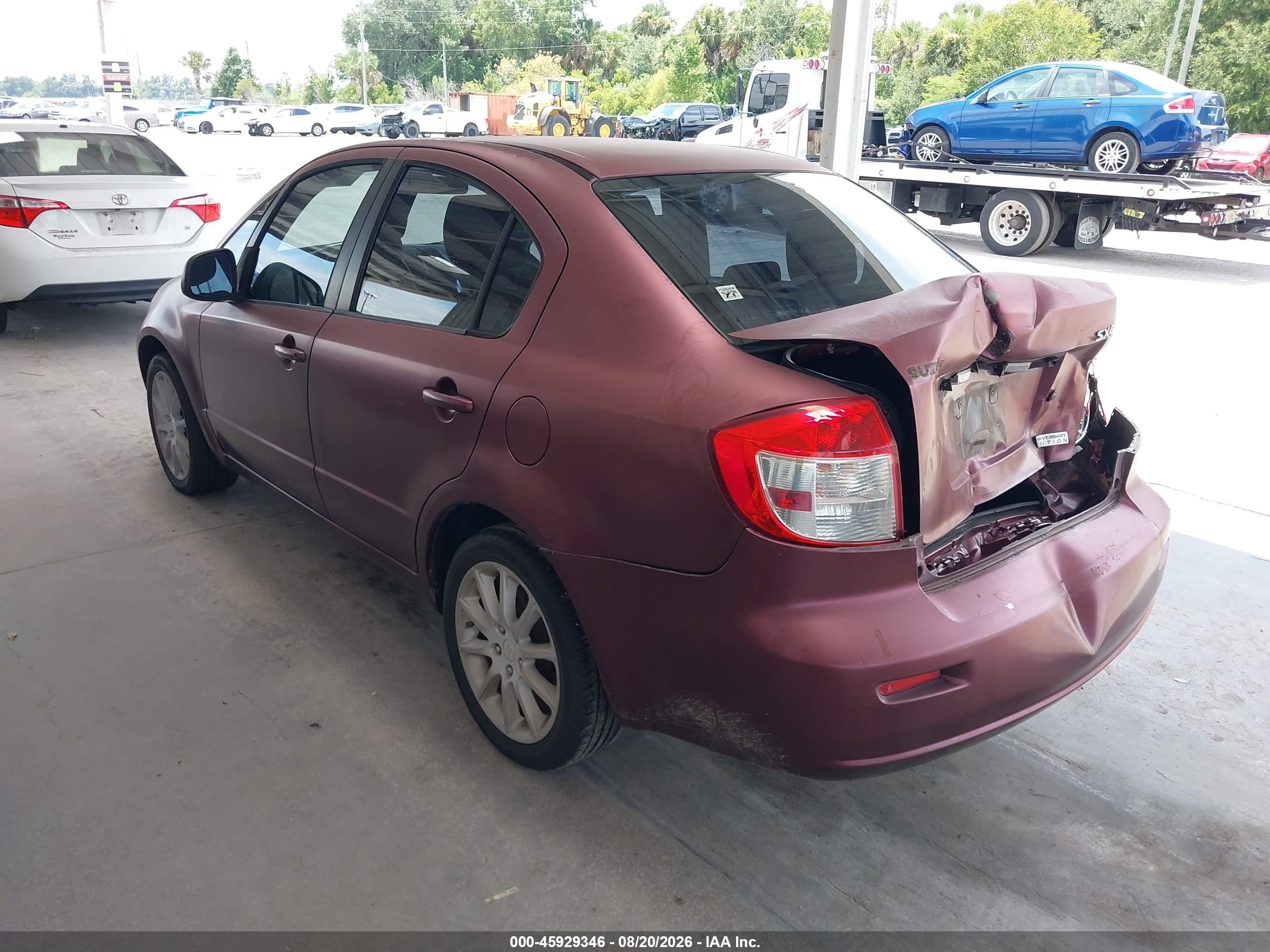 2011 Suzuki Sx4 Le/le Anniversary Edition Burgundy vin: JS2YC5A27B6303273