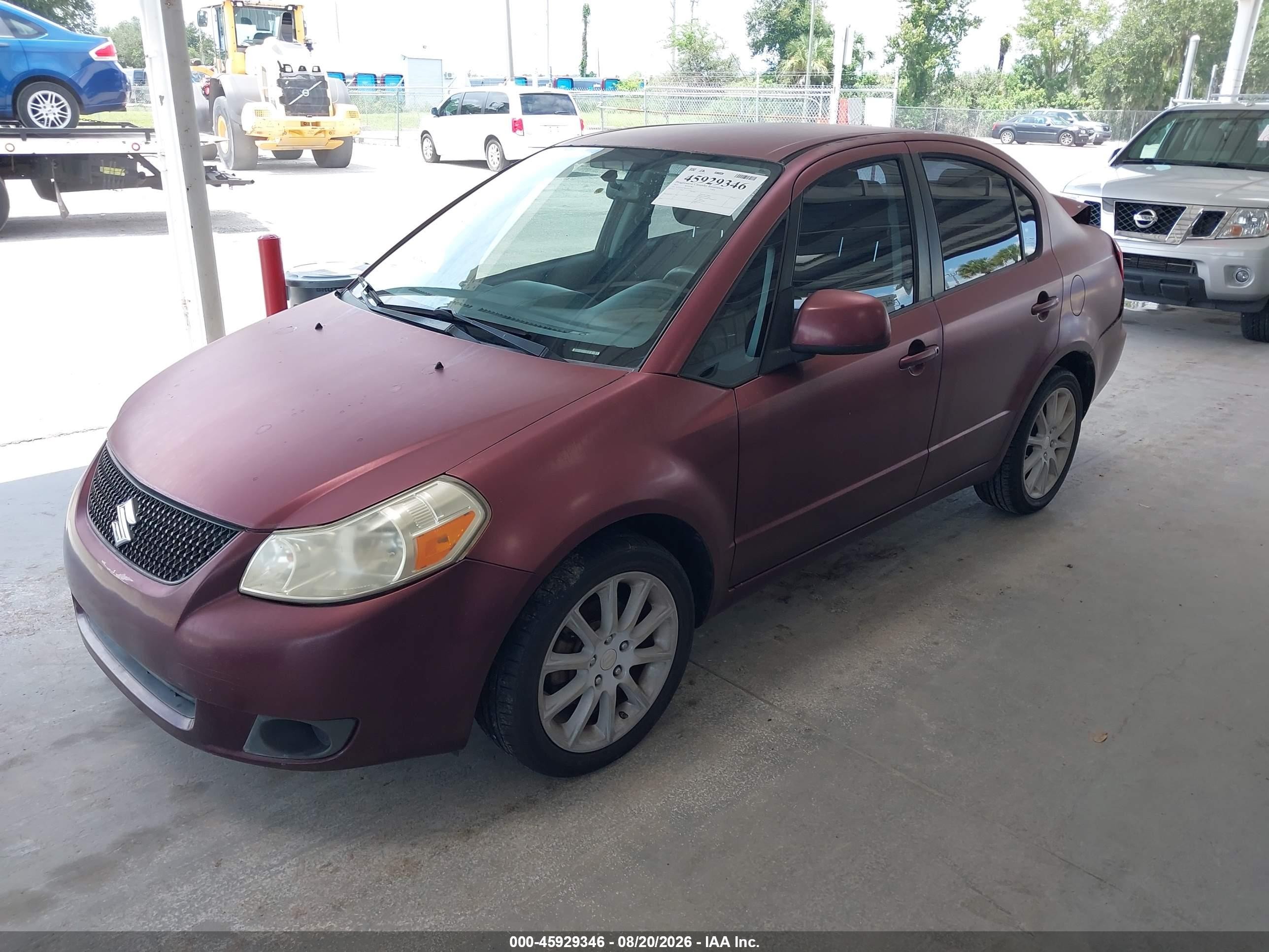 2011 Suzuki Sx4 Le/le Anniversary Edition Burgundy vin: JS2YC5A27B6303273