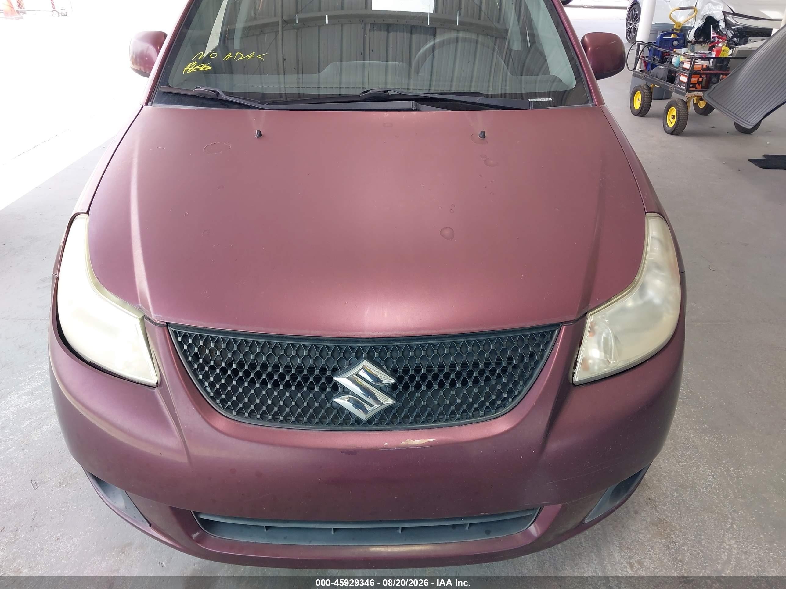 2011 Suzuki Sx4 Le/le Anniversary Edition Burgundy vin: JS2YC5A27B6303273