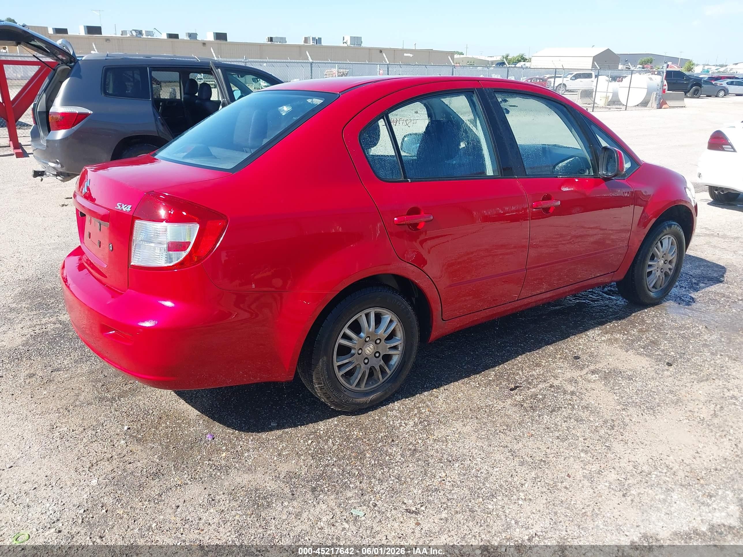 2012 Suzuki Sx4 Le/le Popular Red vin: JS2YC5A30C6304310