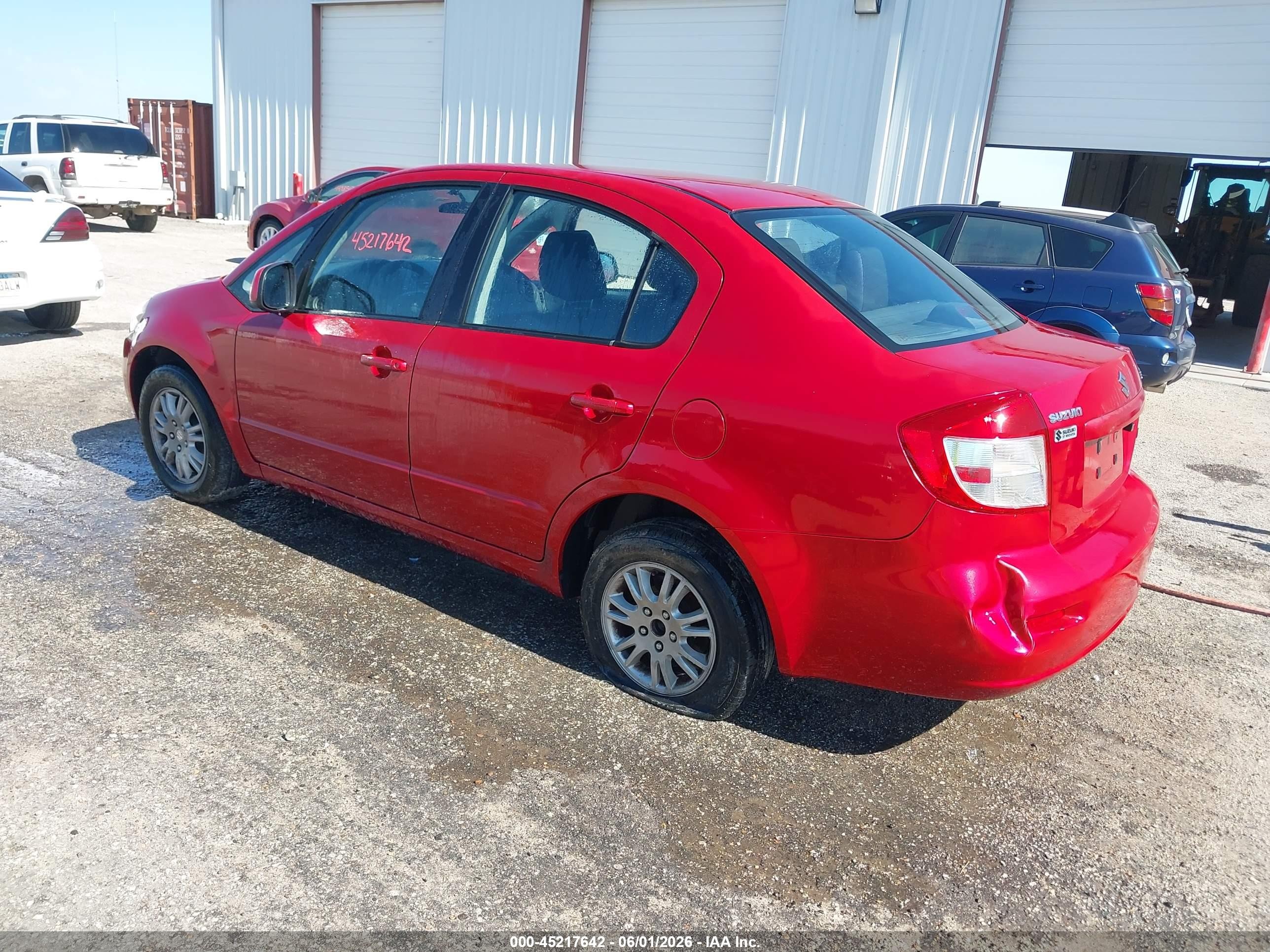 2012 Suzuki Sx4 Le/le Popular Red vin: JS2YC5A30C6304310