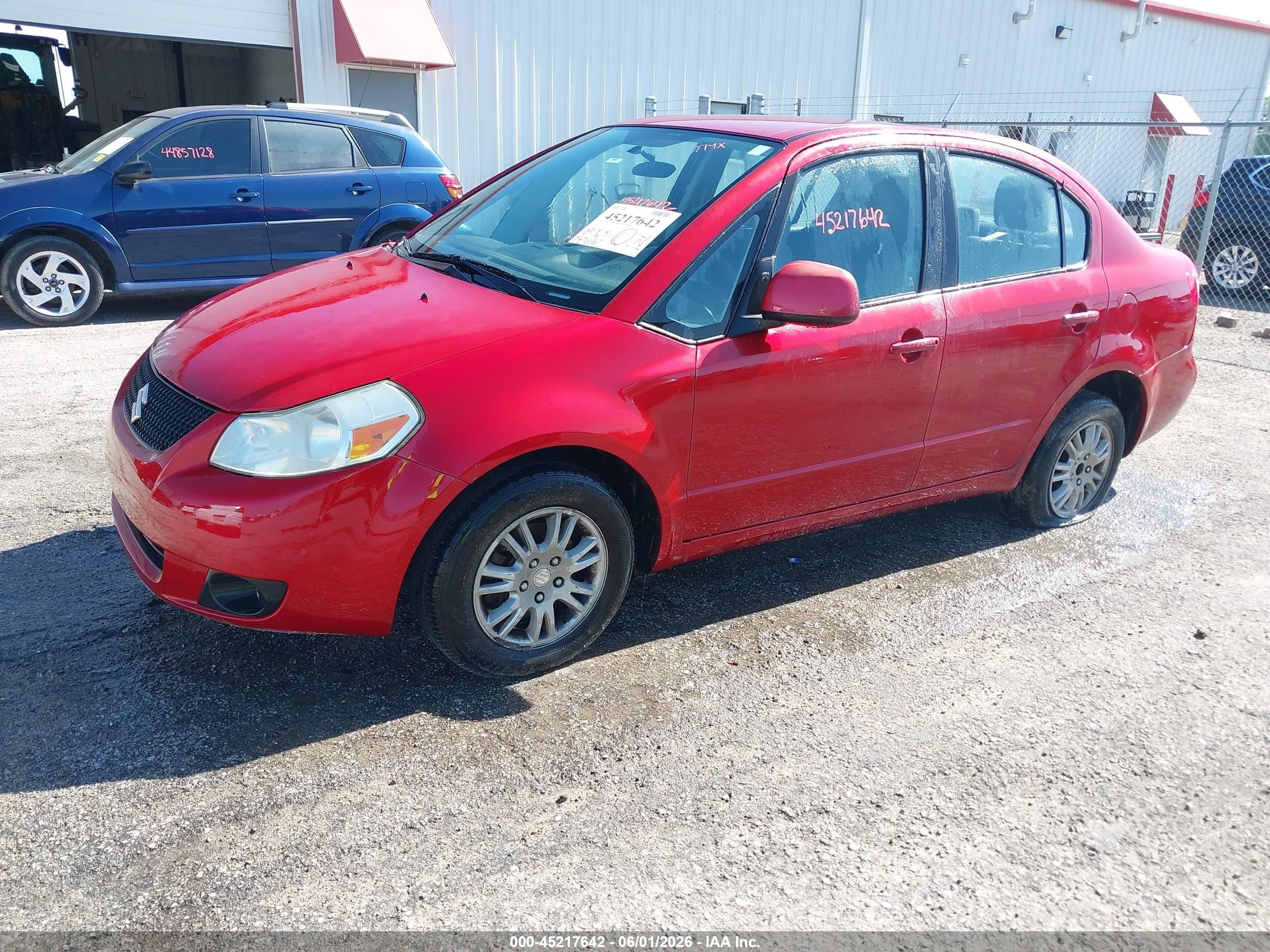 2012 Suzuki Sx4 Le/le Popular Red vin: JS2YC5A30C6304310