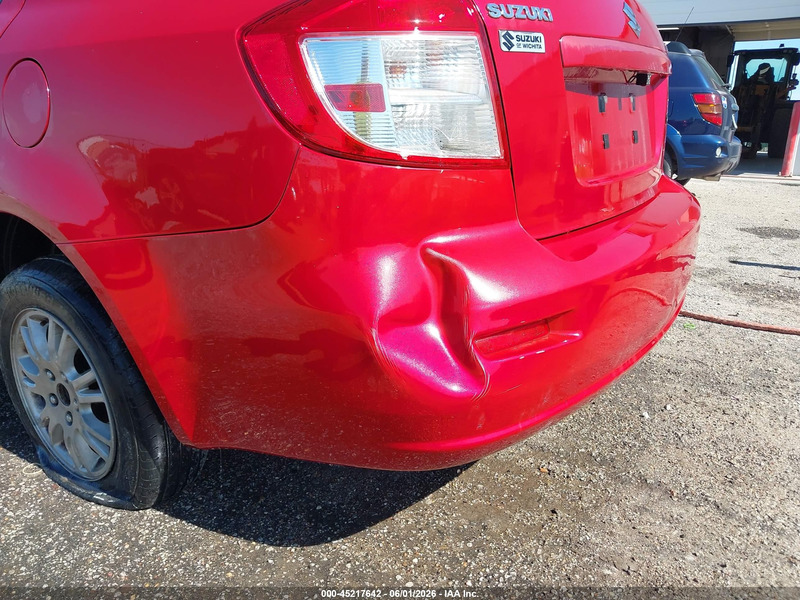 2012 Suzuki Sx4 Le/le Popular Red vin: JS2YC5A30C6304310